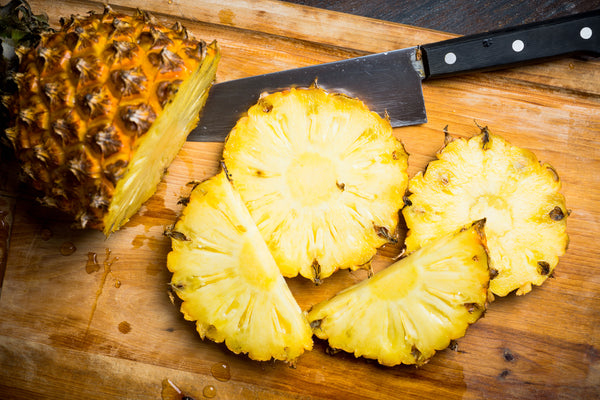A Step-By-Step Guide to Cutting Up a Pineapple