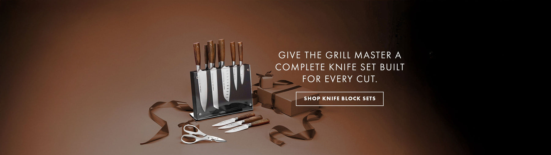 Knife set with a decorative ribbon on a brown background, promoting knife block sets.
