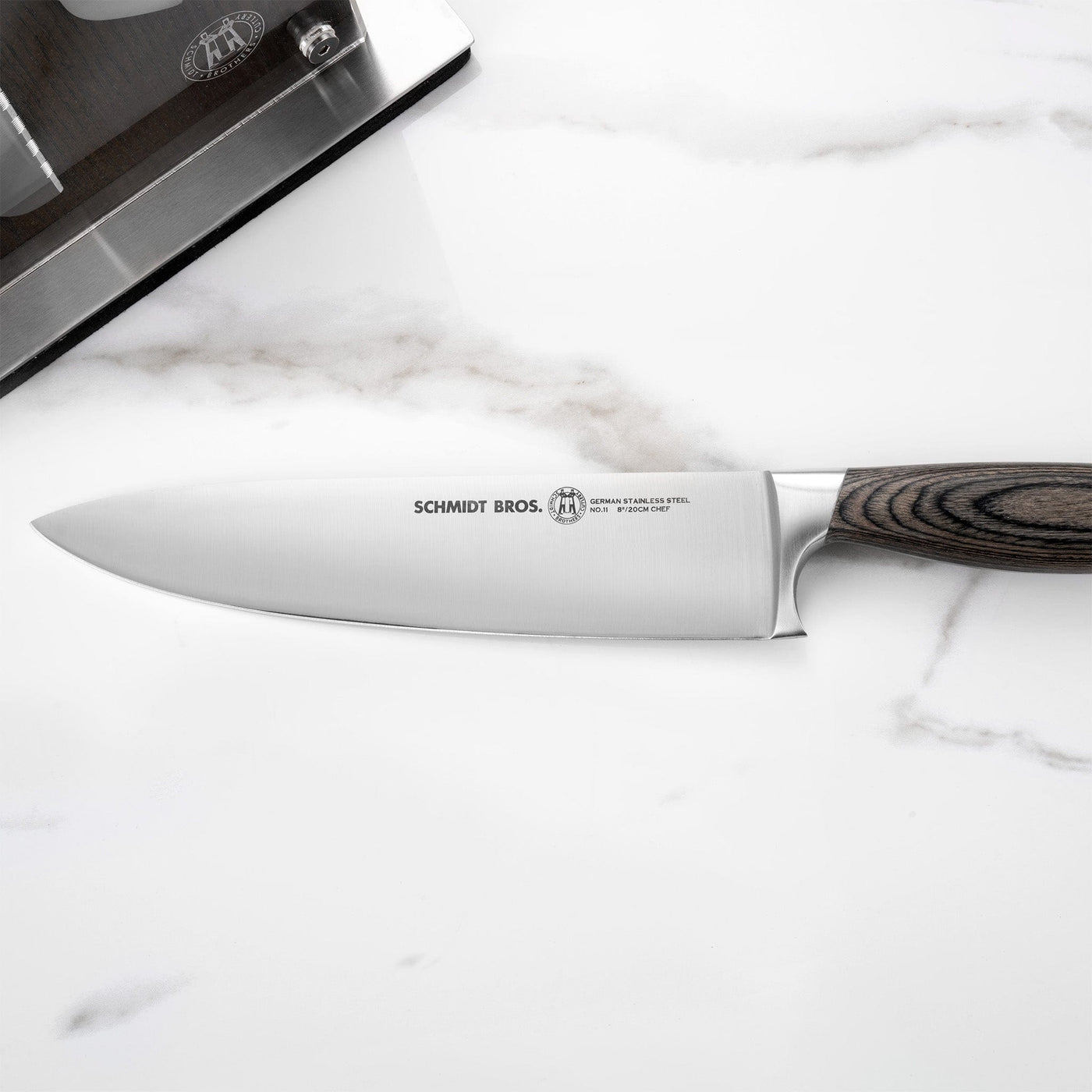 https://schmidtbrothers.com/cdn/shop/files/schmidt-brothers-kitchen-cutlery-schmidt-brothers-bonded-ash-7-piece-knife-set-high-carbon-stainless-steel-cutlery-with-black-ash-wood-and-acrylic-magnetic-knife-block-30758452887613_1400x.jpg?v=1684518764