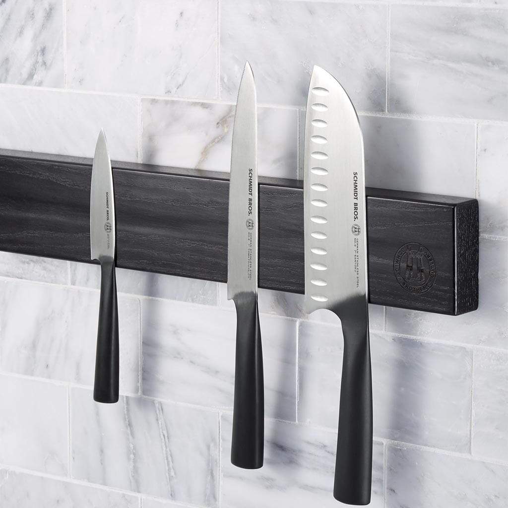 https://schmidtbrothers.com/cdn/shop/products/schmidt-brothers-kitchen-cutlery-schmidt-brothers-black-18-magnetic-wall-bar-universal-storage-for-up-to-8-10-knives-28383298977853_1400x.jpg?v=1633363149