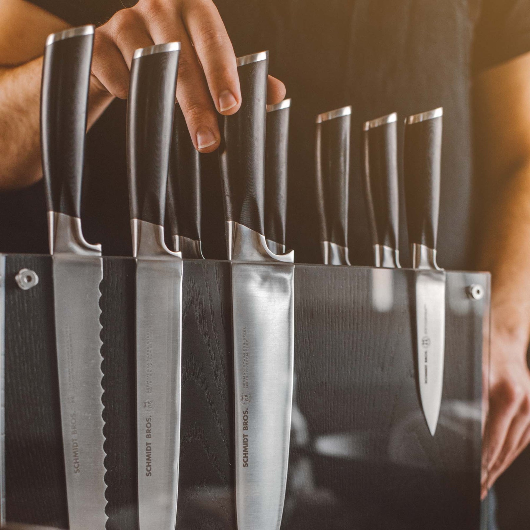 https://schmidtbrothers.com/cdn/shop/products/schmidt-brothers-kitchen-cutlery-schmidt-brothers-heritage-series-12-piece-knife-set-high-carbon-stainless-steel-cutlery-and-acrylic-magnetic-knife-block-28378211713085_1800x.jpg?v=1683912212